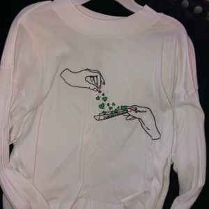 White long sleeve love rolling